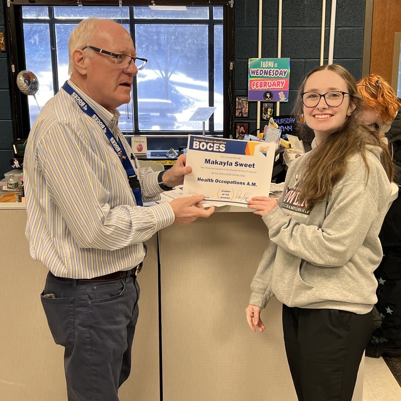 Student receiving an award
