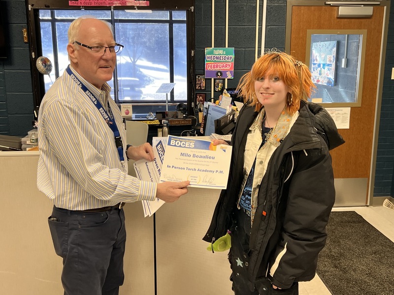 Student receiving an award