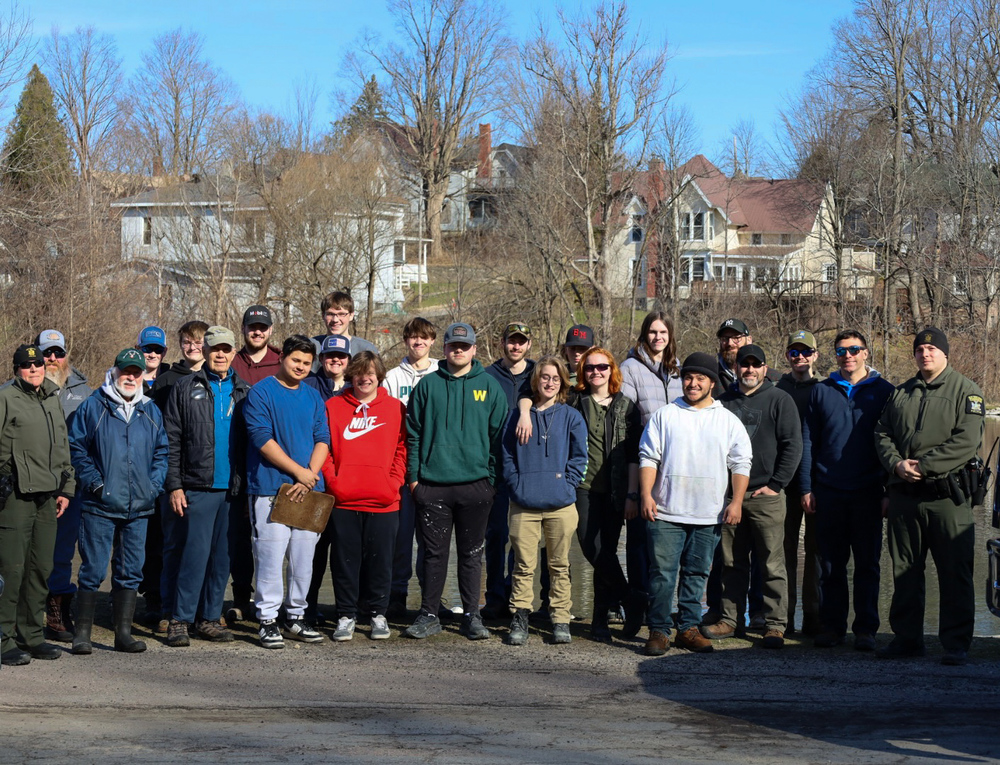 Building trade students smiling together.