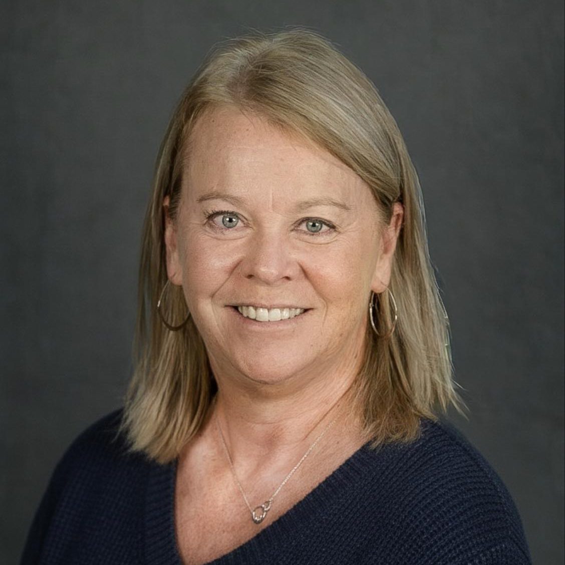Lori Tourville. Headshot portrait photo