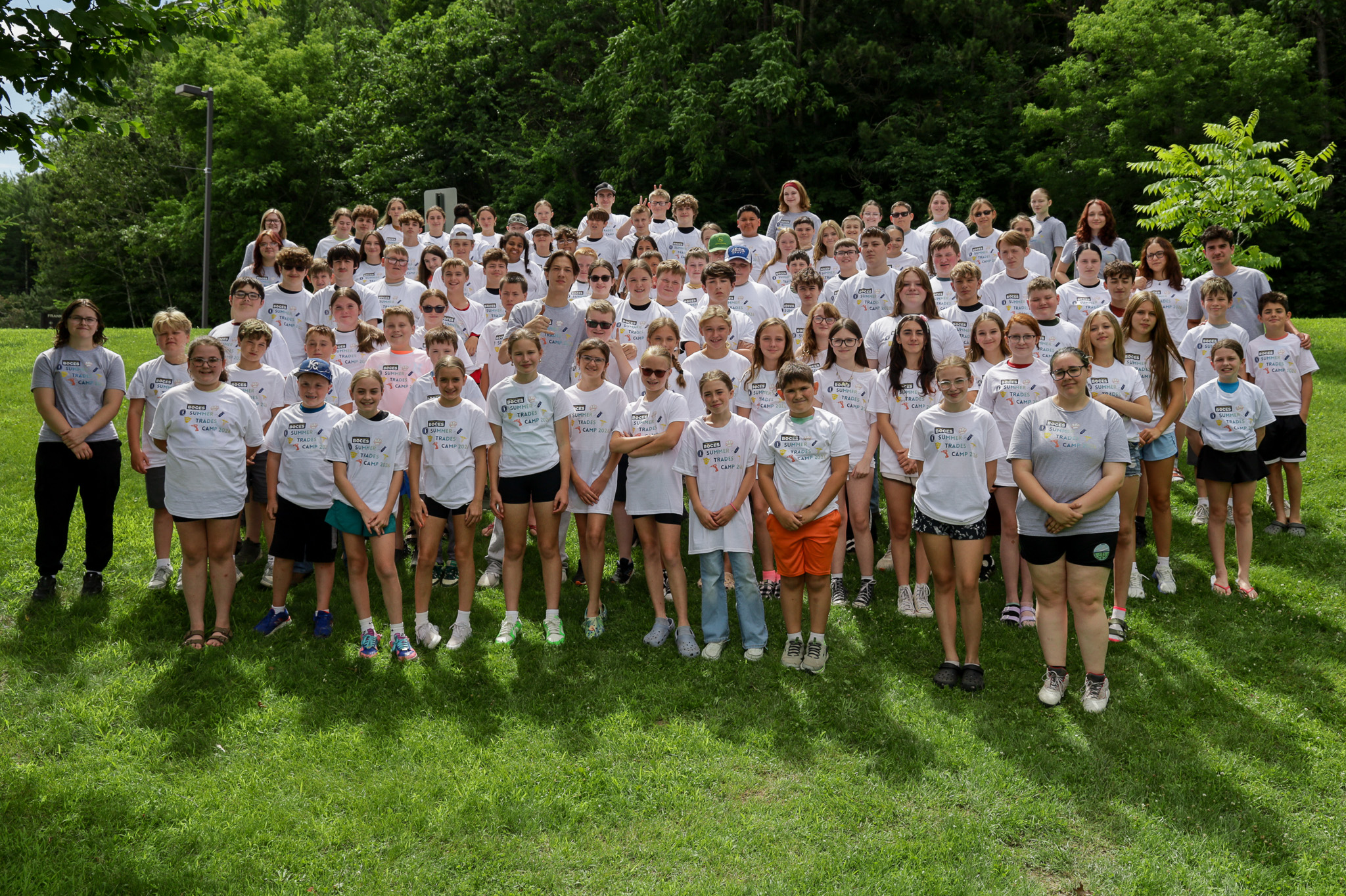 Group photo of Summer Trades Camp participants and camp counselors.