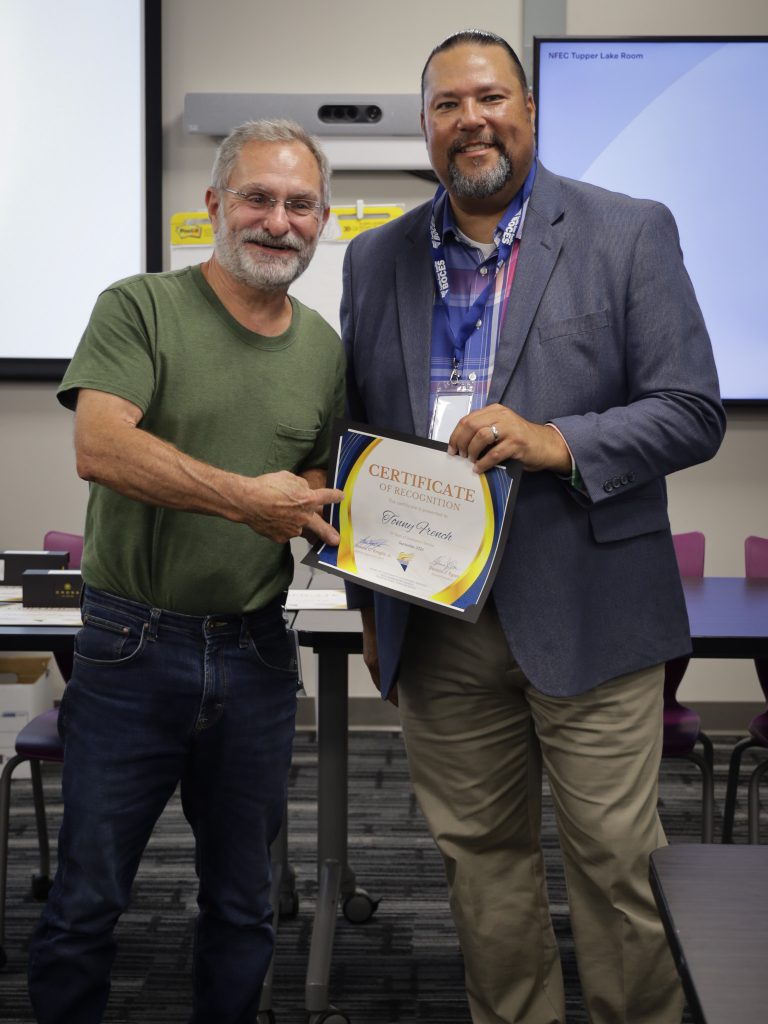 James Knight and Tonny holding certificate